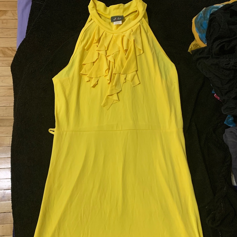 Bright yellow dress with chest ruffles